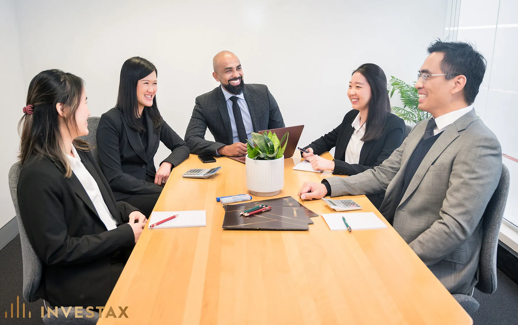 Camden advisors in a client meeting
